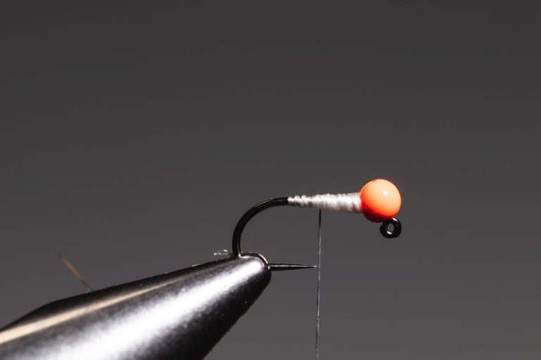 step4how to tie a micro bugger fly -