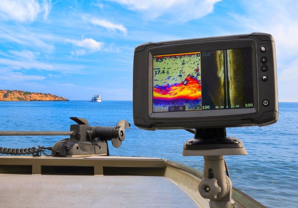 https://intoflyfishing.com/wp-content/uploads/2020/12/A-close-up-photo-of-fishfinder-on-a-boat..jpg