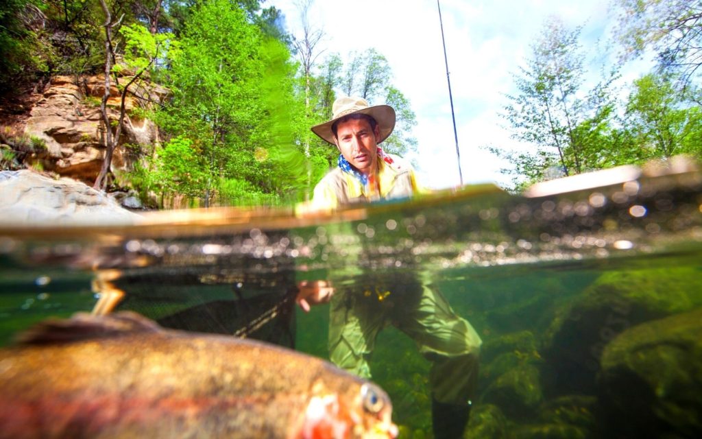 A fly angler caught a huge fish on a wet fly fishing
