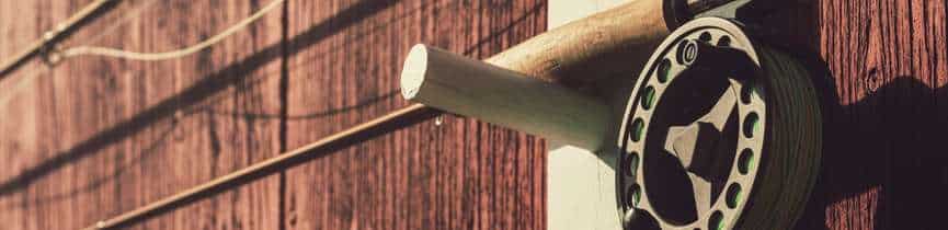 A photo of some of the best fly rods hanging on my wall