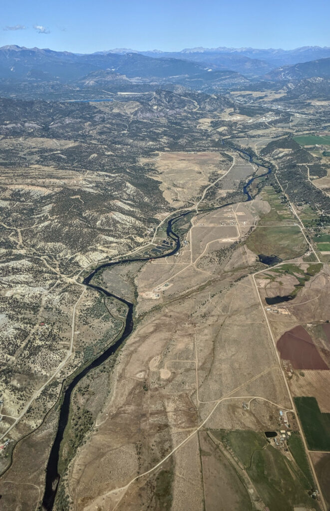 Aerial view of the Animas River valley running south out of Durango, Colorado through open ranch country