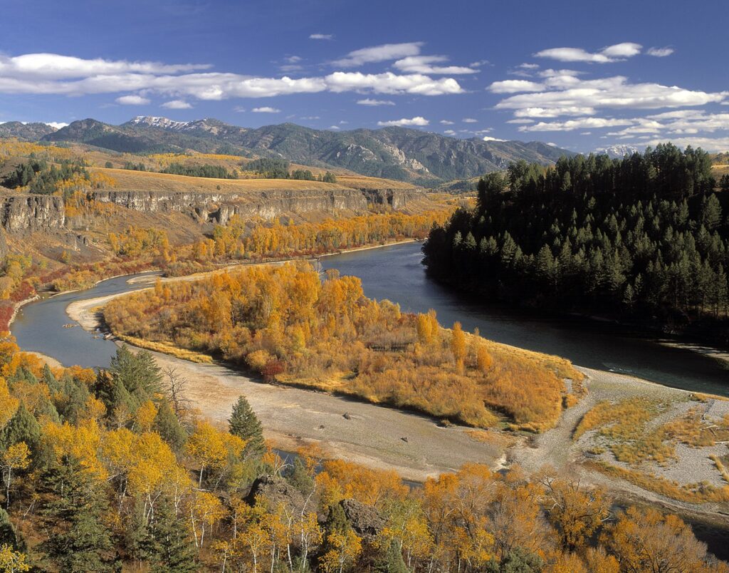 The South Fork of the Snake River through a fall-colored valley in southeastern Idaho
