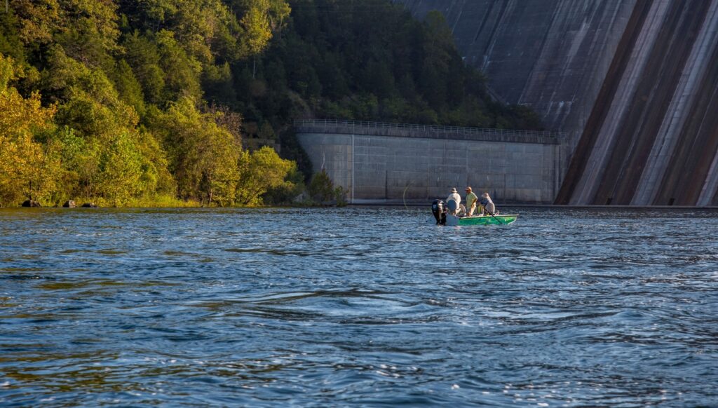 Anglers in a boat near Bull Shoals Dam on the White River in Arkansas.