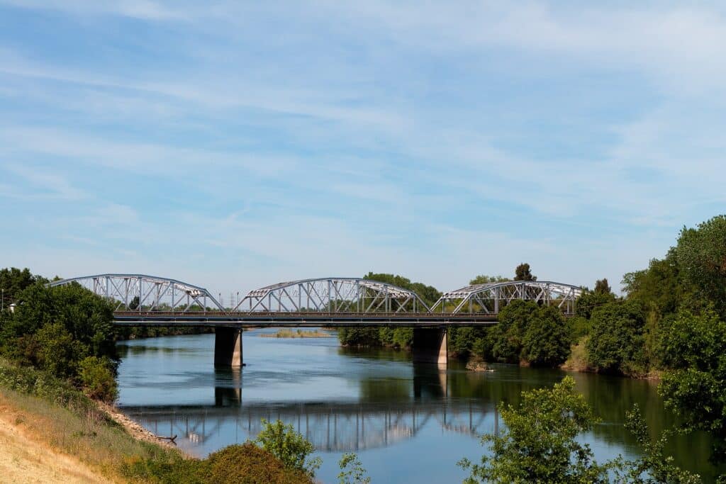 American River flowing beneath J Street Bridge near Sacramento