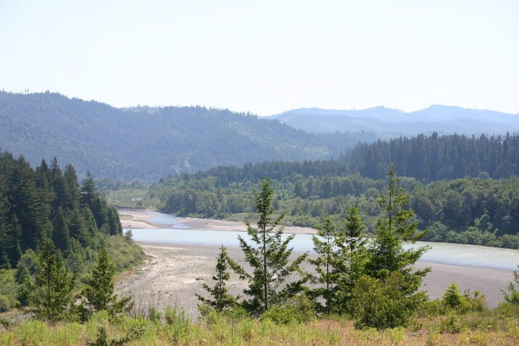 Eel River winding through a forested Northern California valley