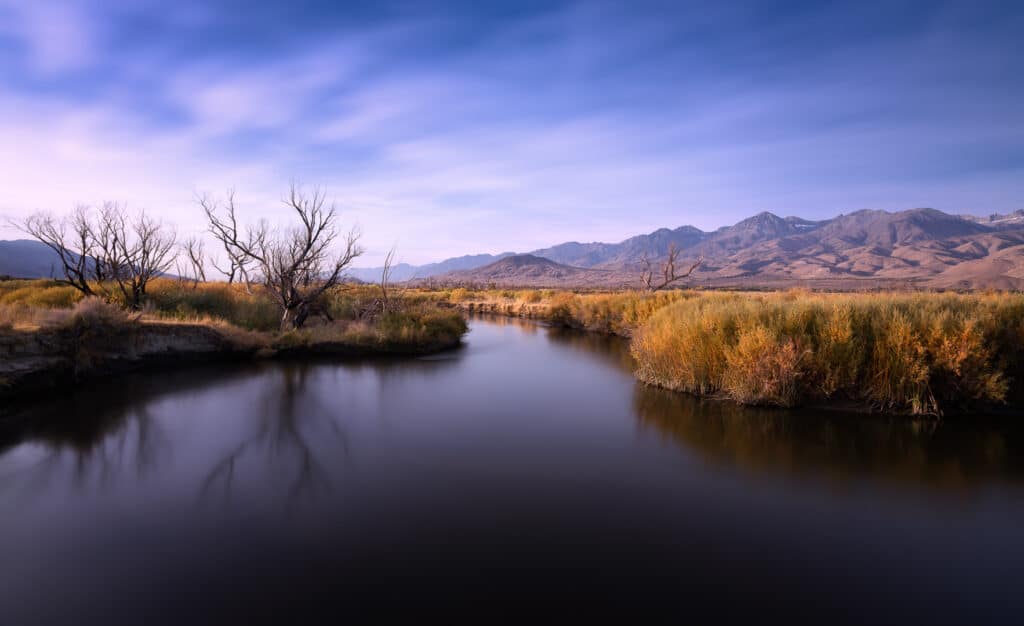 Owens River winding past grasses and mountains near Big Pine